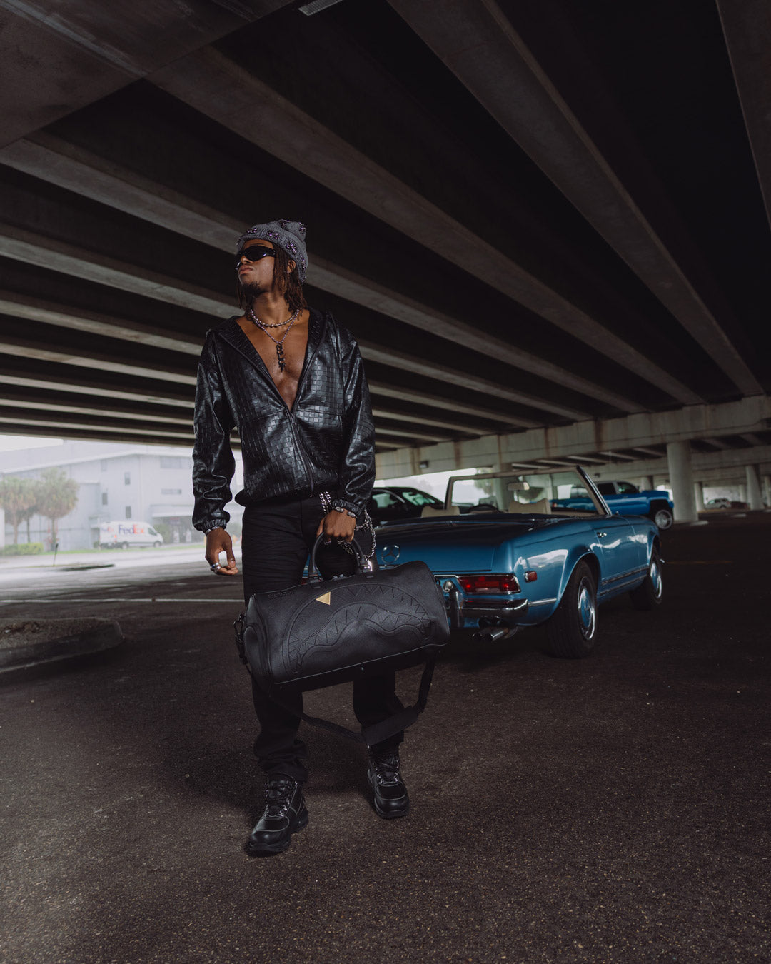 THE GOLDEN FANG SHARK DUFFLE